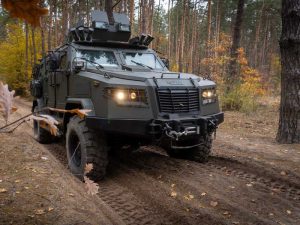 Custom made wheels manufacturing for heavy-duty military and commercial applications with large off-road tires.